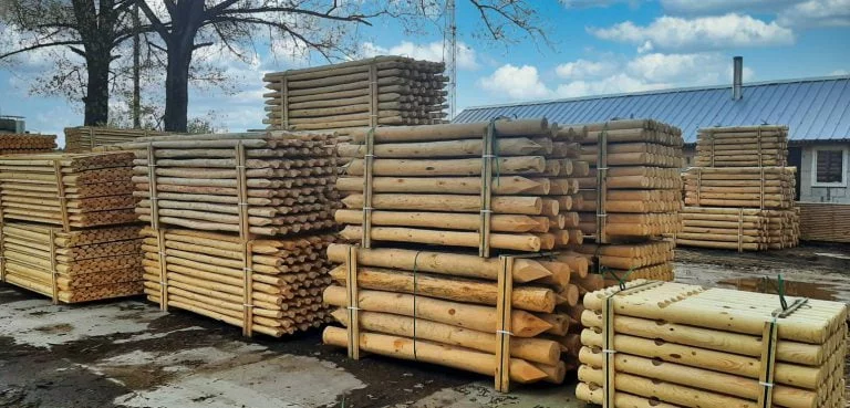 Stack of impregnated woodpoles